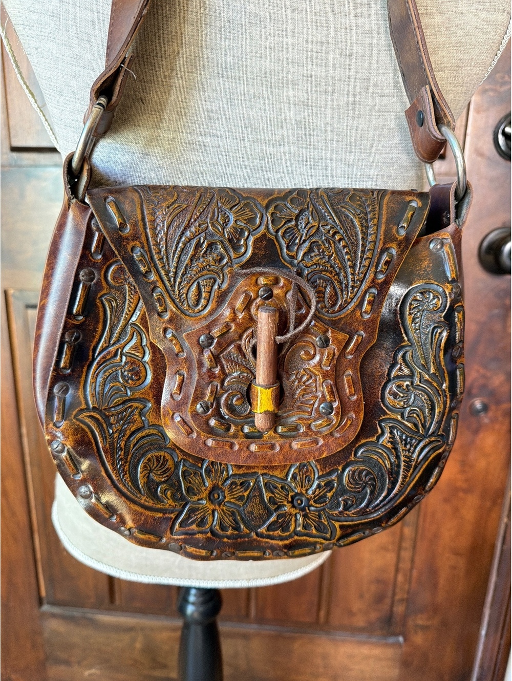 Vintage Hand-Tooled Leather Crossbody Bag with Floral Design
